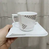 سرویس فنجان و نعلبکی و قندان چینی توس