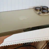 ایفون۱۴پرومکس ریجستر گلد درحد اکبند