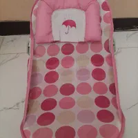 پشه بند و وان حمام نوزاد