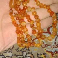 تسبیح عقیق پرتغالی تراش نخورده ۱۰۱ تایی درجه یک