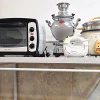 وسیله برقی و میز نهارخوری