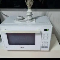 ماکروفر سولاردم 40لیتری کم استفاده شده ال‌جی اصل