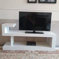 فروش میز تلویزیون  و ساعت دیواری