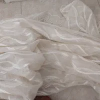 پرده دوخته شده با میل پرده و حلقه نصب