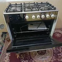 یک عدد اجاق گاز فردار استیل و دو عدد طرح فر