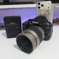 دوربین نیکون3100d ولنز ۲۸-۸۰باگلس ولوازم