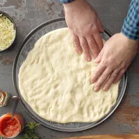 تهیه خمیر پیتزا خانگی