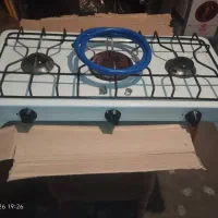 گاز سه شعله رومیزی همراه با کابیتن فلزی سه طبقه