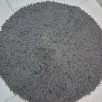 یه عدد فرش گرد مناسب اتاق خواب