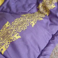 رو تختی به همراه پتو و رومتکایی