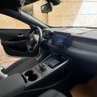 بی وای دی چین پلاس پلاگین هیبرید سفید 2025