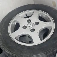 رینگ فابریک پژو ۲۰۷ پنج پر(تورنادو) و لاستیک خارجی