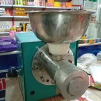 دستگاه کره گیری بادام وغیره