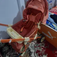 یک کالسکه به همراه روروعک و کریر