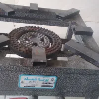 یک عدد اجاق گاز و دو عدد چوب لباسی