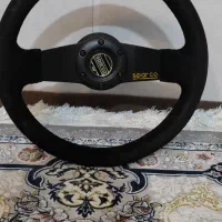 منبع اگزوز و فرمان اسپرت