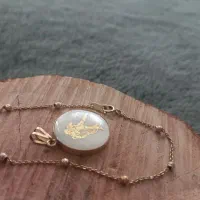 دستبند و پلاک طلا و آویز گردنی مجموعا ۳ گرم