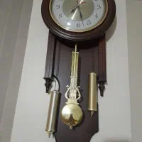 یکعددساعت دیواری.درخیابان فروغی