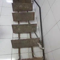 پله اهنی با نرده حفاظ