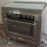 اجاق گاز تمام استیل ۵ شعله فردار تاکنو مدل ربیون