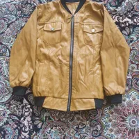 ۲عددکاپشن اصل چرم مناسب ۹سال