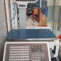 ترازو دیجیتال و دستگاه پرس برقی پلاستیک