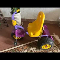سه چرخه همراه با دسته کمکی