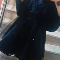 یک عدد لباس مشکی عروسکی