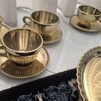 فنجان و نعلبکی طلایی