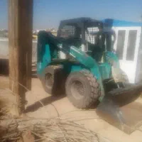 اجاره مینی بیل لاستیکی پاکت و چکش و اجاره بابکت