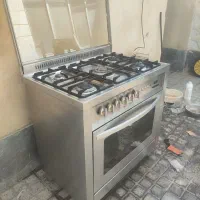 اجاق گاز مبله اخوان  تمام استیل نگیر ظاهر نو نو