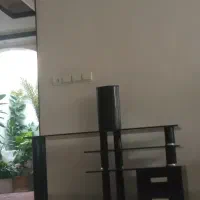 میز تلویزیون شیشه ای