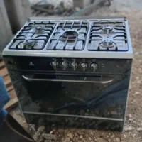 گاز طرح فر. بخاری. تخت دو نفره