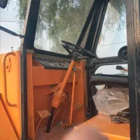 یکدستگاه بیل بکهو مدل ۸۷ و یک دستگاه تراکلود