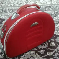 کیف برزنتی قرمز رنگ مسافرتی