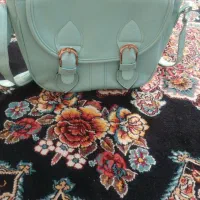 دوعدد کیف اولی 200 تومن مینی 100 تومن