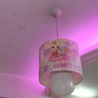 لوستر و فرش و پرده و پادری اتاق کودک