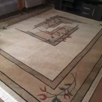 زیر تلویزیونی و قالی