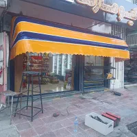 سایبان مغازه چادر متری1500 رنگ آبی نارنجی مات