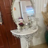 آینه و شمعدان با ساعت