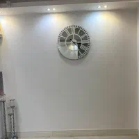 ساعت آینه ای و تابلو آینه ای