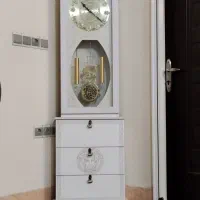 بخاری. ساعت ایستاده. میز تلویزیون