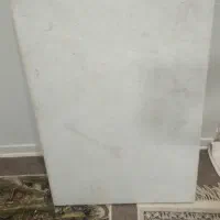 سنگ و تلوزیون و کامپیوتر و میزش