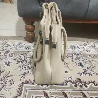کیف زنانه کرمی رنگ بدون پارگی وخراش