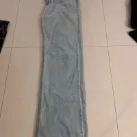 شلوار جین ابی راسته نیم‌بگ و لباس ورق بزنید