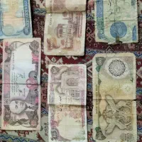 تعدادی سکه و اسکناس قدیمی و خارجی