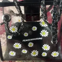 کیف طلقی طرح بابونه همراه با یه کیف کوچک