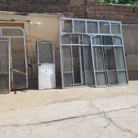 انواع درب پنجره ودرب جلو مغازه الومینیومی