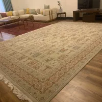 فرش ماشینی ۱۲ متری طرح خشتی (کرم پیازی)  در حد نو