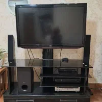 میز تلویزیون شیشه‌ای